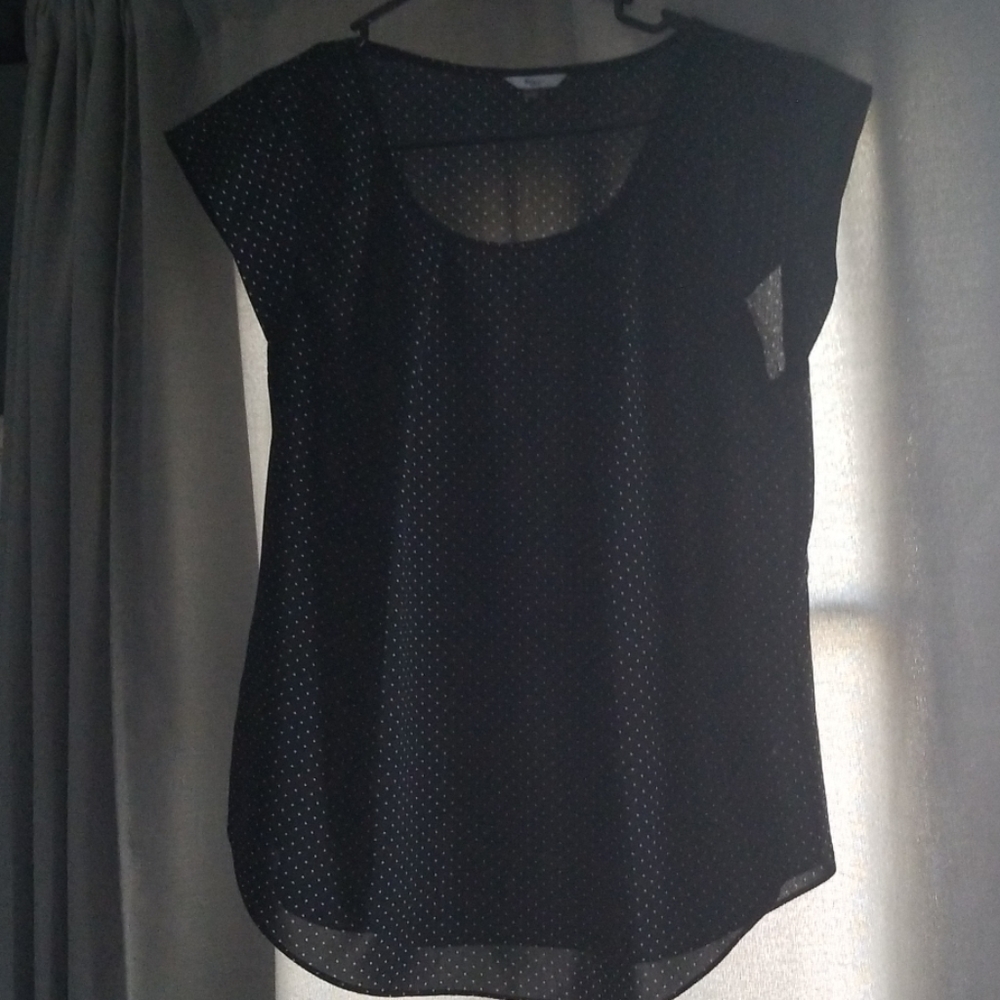 Black polka dot shirt